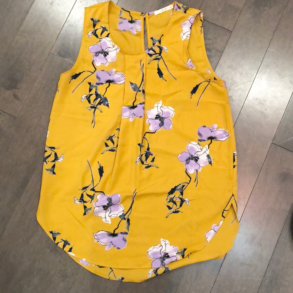 Yellow sleeveless top